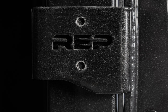 Close-up shot of the laser-cut branding on the REP Fitness Altitude™ J-Cups