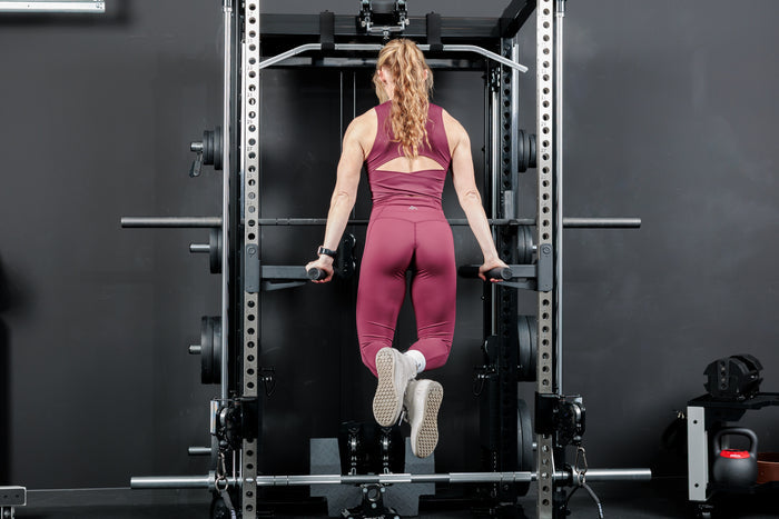 Athlete doing dips on the Altitude™ Dip Attachment