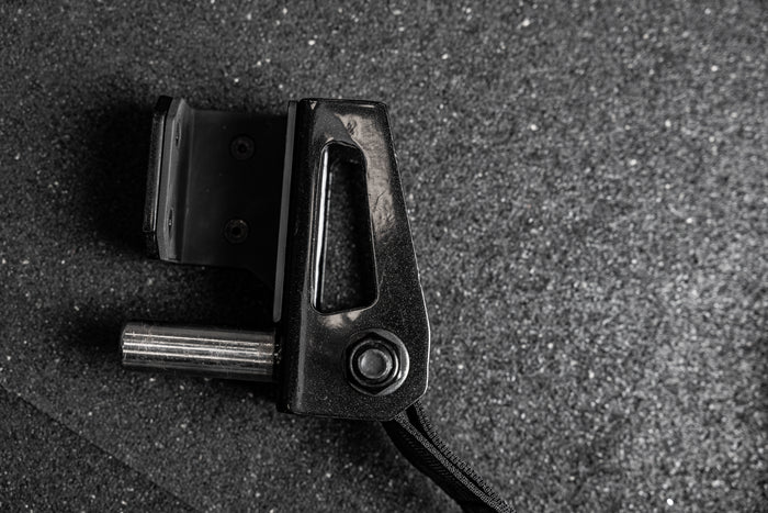 Close-up of the REP Fitness Altitude™ Power Rack Strap Safeties rack attachment hardware