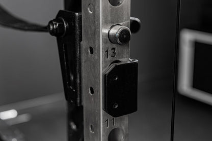 Backside of the REP Fitness Altitude™ Power Rack Strap Safeties on a rack upright