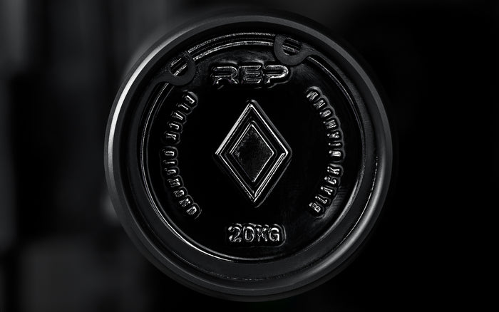 Close-up view of the premium metal end cap on the Black Diamond Power Bar.