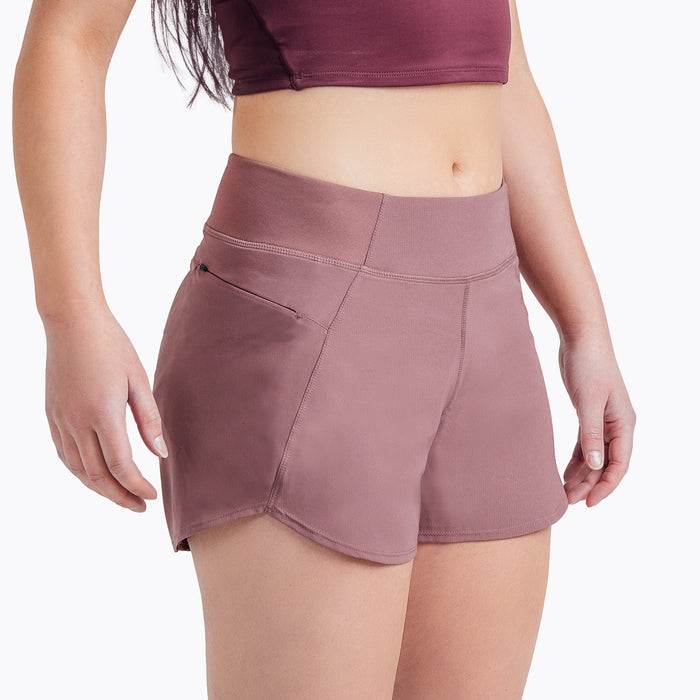 The REP Fitness Women's Artemis Shorts in Mauve front, angled close-up
