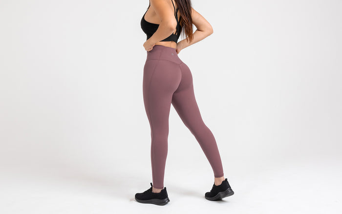 The REP Fitness Women's Eos Legging in Mauve back, hands on hips
