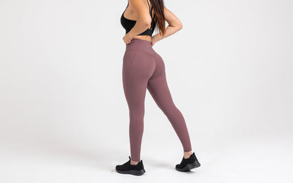 The REP Fitness Women's Eos Legging in Mauve back, hands on hips