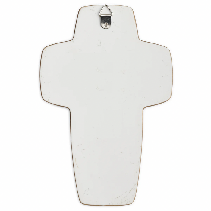 Decorative cross with a silver hook on a white background