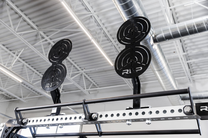 Two of the REP Fitness Crossmember Mount Wall Ball Targets on an 82 inch crossmember