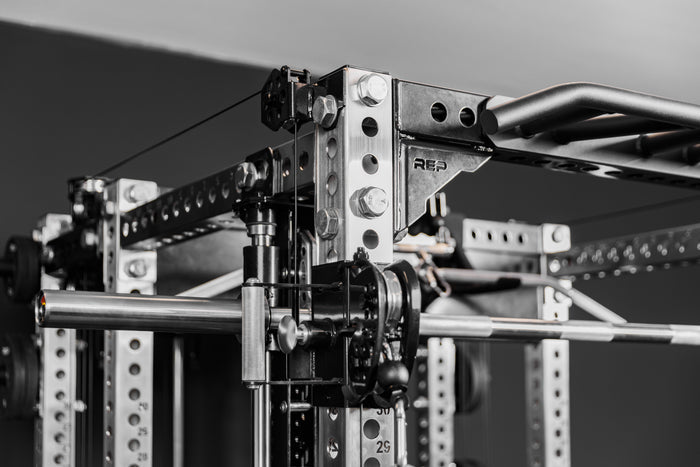 Close-up shot of the Crossmember Multi-Grip Pull-Up Bar on the front of a PR-5000 rack