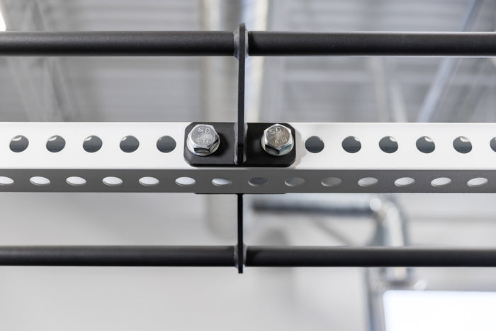 Close-up shot of the REP Fitness Double Pull-Up Bar's center bolts