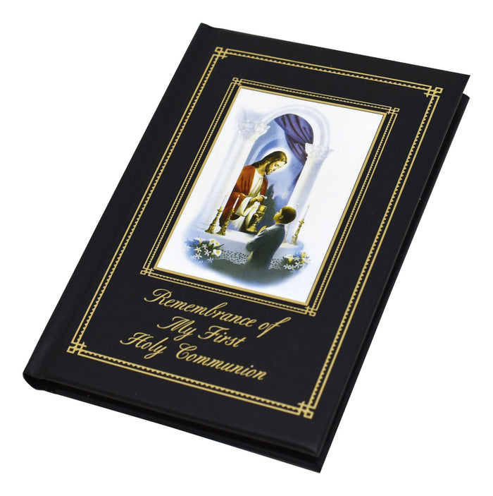Book titled 'Remembrance of My First Holy Communion' with a religious illustration on a white background