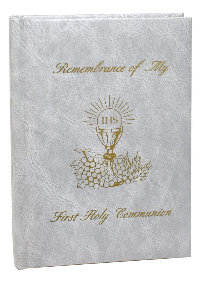 White book titled 'Remembrance of My First Holy Communion' on a white background