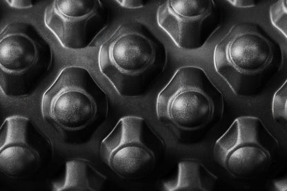 Close-up of Black "peak" texture on High Density Foam Roller