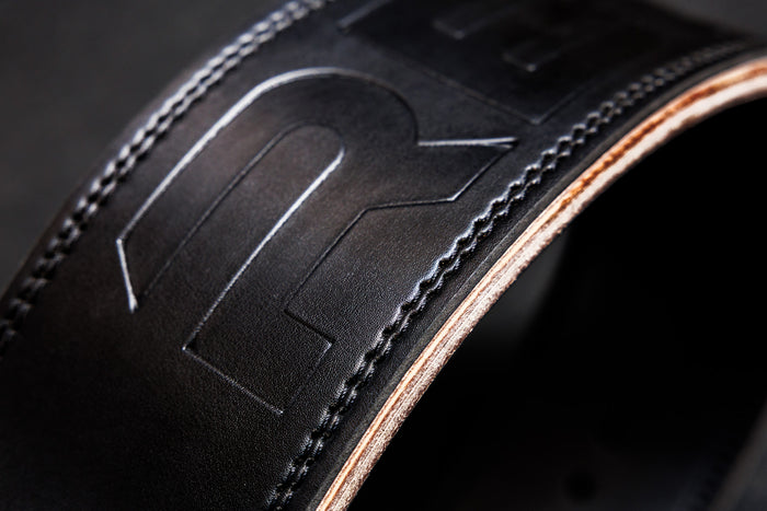 Close-Up: REP Leather Lifting Belt in Black with debossed REP branding and reinforced stitching