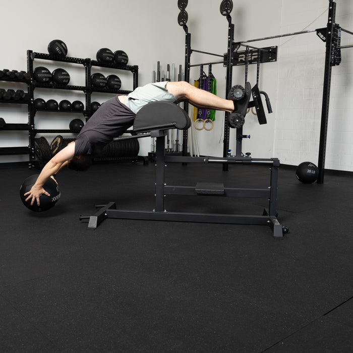 Athlete using the REP Fitness Medicine Balls 2.0