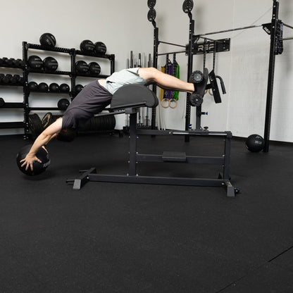 Athlete using the REP Fitness Medicine Balls 2.0