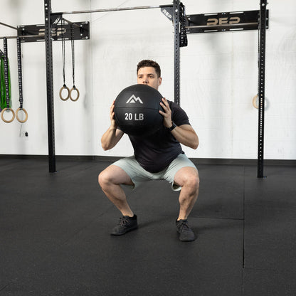 Athlete using the REP Fitness Medicine Balls 2.0