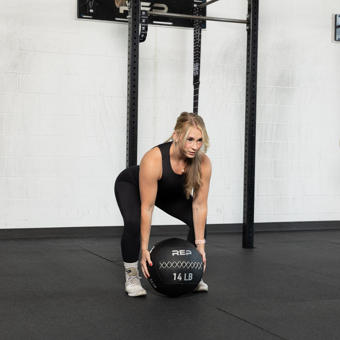 Athlete using the REP Fitness Medicine Balls 2.0