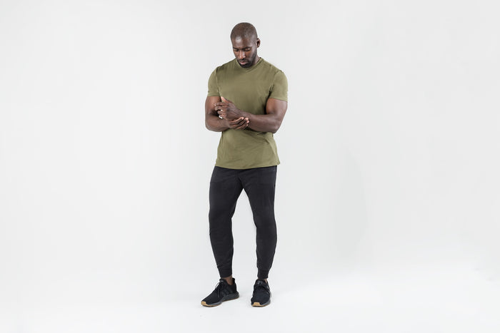 The REP Fitness Men's Apollo Joggers in Heather Black front, lifestyle front-facing