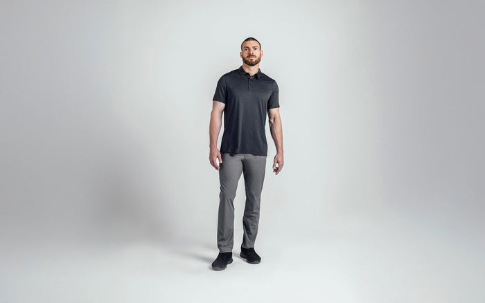 The REP Fitness Men's Audax Performance Polo in Heather Black/Cool Gray front