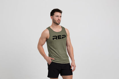 The REP Fitness Men's Daily Driver Tri-Blend Tank in Heather Olive/Black on model