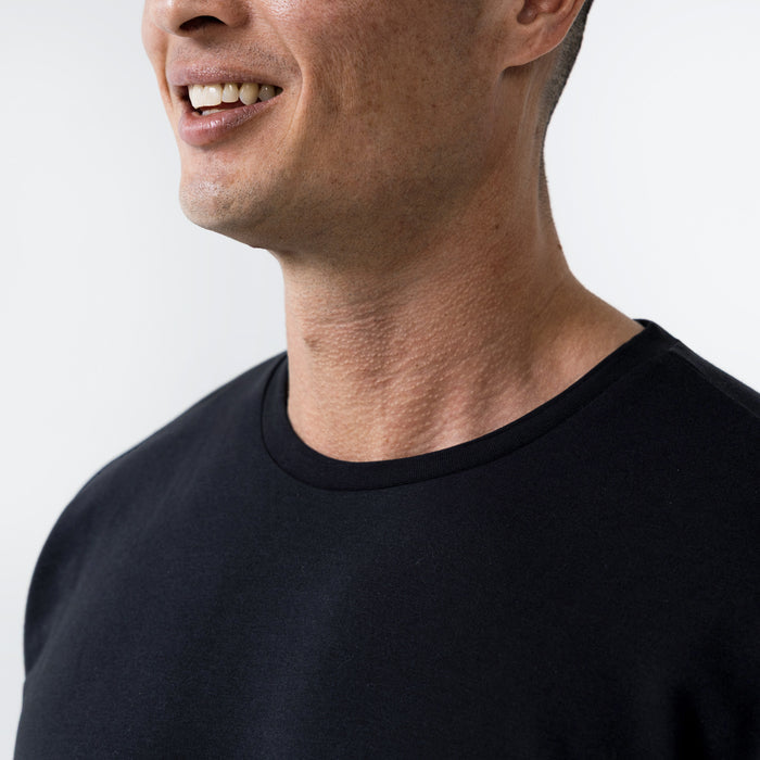 The REP Fitness Men's Magnis Heavyweight T-Shirt in Black front neck detail