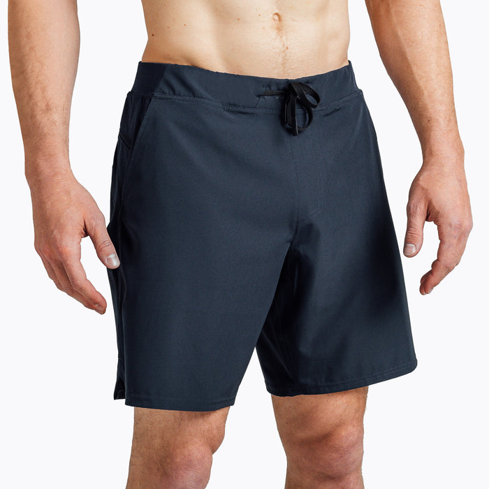 The REP Fitness Men's Pinnacle Shorts in Navy on body, close-up