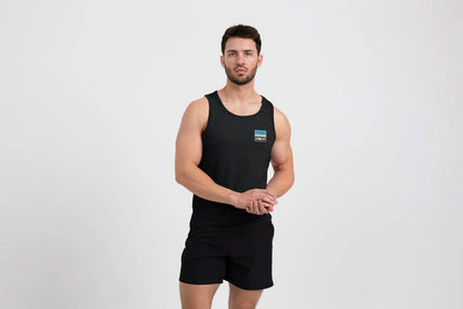 The REP Fitness Men's Rise Tri-Blend Tank in Heather Black/Blue front, on model