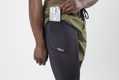 The REP Fitness Men's Virtus Light Compression Tights in Black front, pocket detail