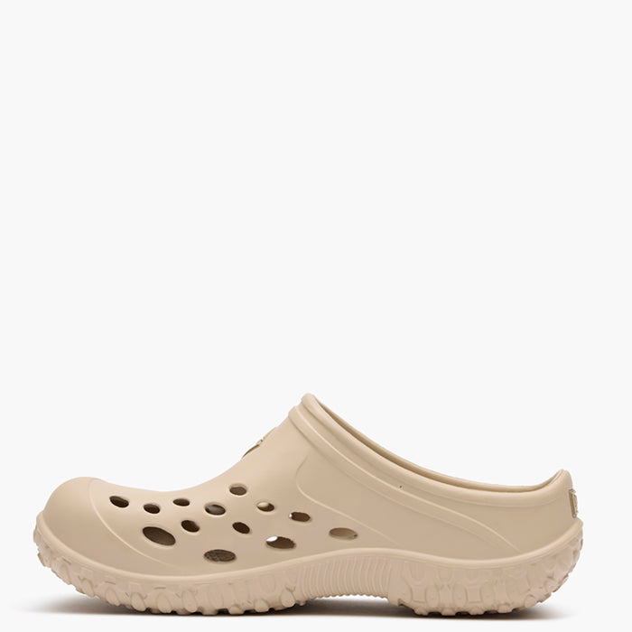 Beige clog shoe on a white background