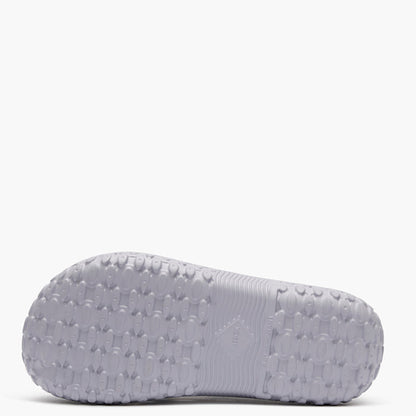 Gray sandal sole with textured pattern on a white background