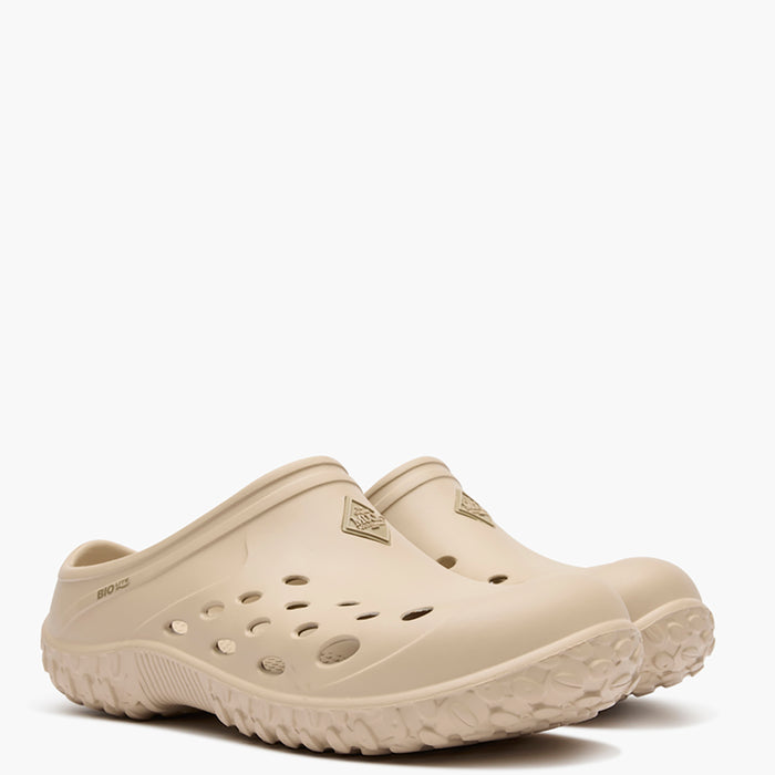Beige clogs on a white background