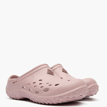 Pair of light pink clogs on a white background