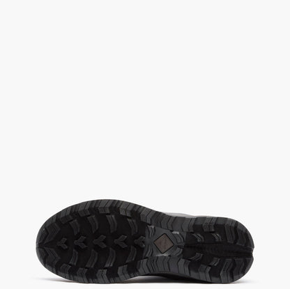 Black sole of a Muck shoe on a white background