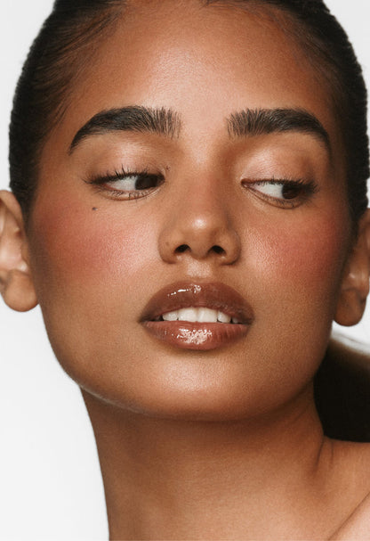 Elsadieka wears peptide lip tint honey mango