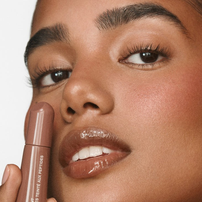 elsadieka with peptide lip tint macadamia butter