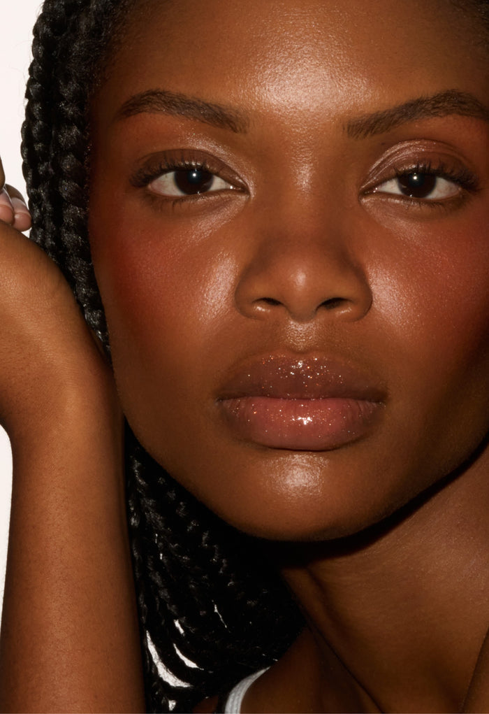 model wearing peptide lip tint sweet apple