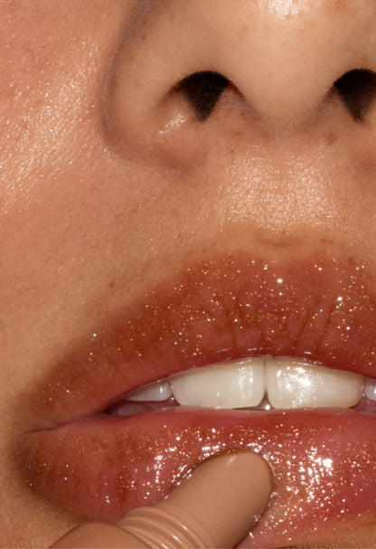 model wearing peptide lip tint sweet apple