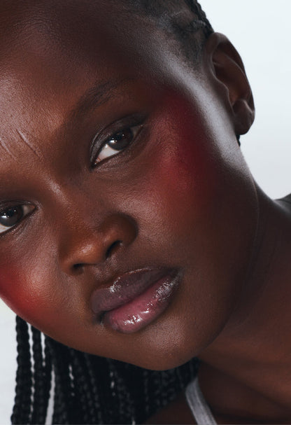 monica wears peptide lip tint in sweet pea
