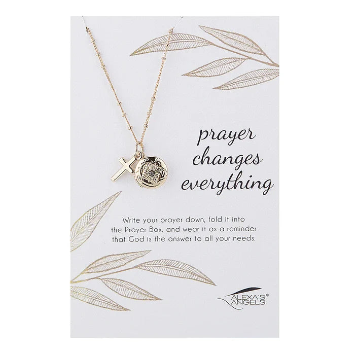 Necklace with pendant on a card with 'prayer changes everything' text, featuring Texas Angels brand.