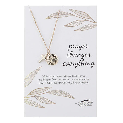 Necklace with pendant on a card with 'prayer changes everything' text, featuring Texas Angels brand.