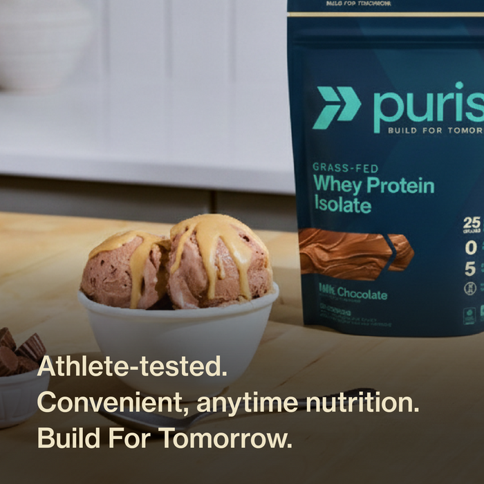 Purist® whey protein isolate package milk chocolate with a bowl of ice cream on a wooden surface. Athlete-tested. Convenient, anytime nutrition. Build For Tomorrow.