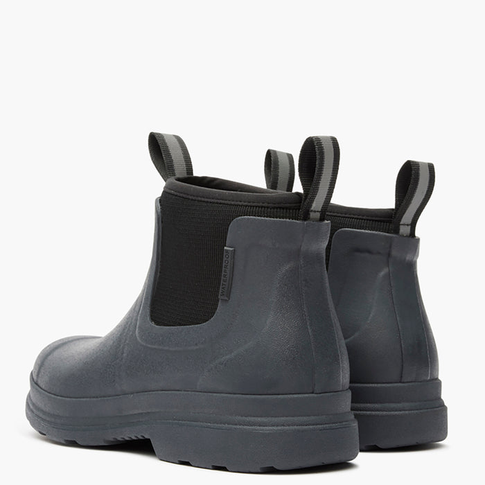 Pair of gray rubber boots with elastic sides on a white background