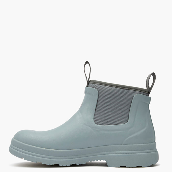 Light blue rubber boot with a gray patch on a white background