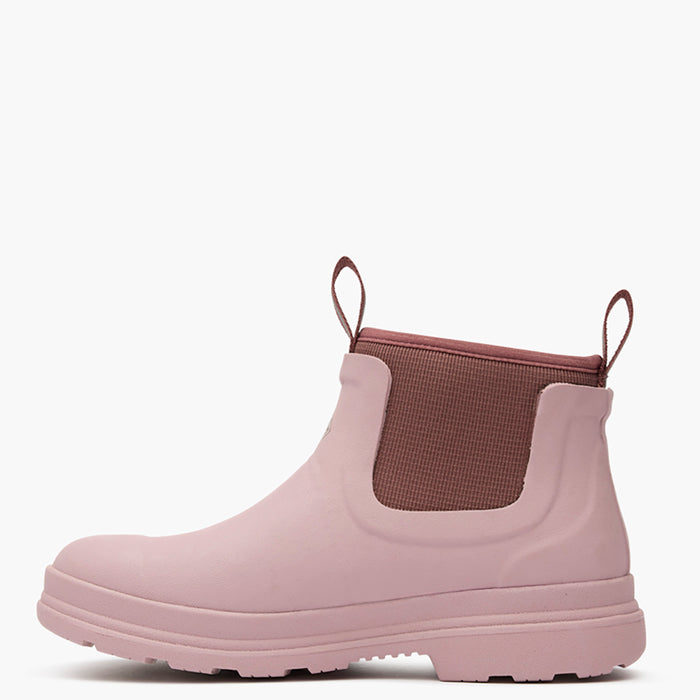 Pink rain boot with brown patch on a white background