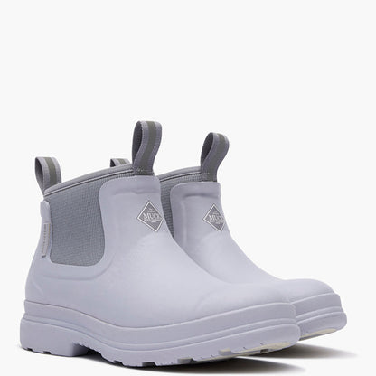 Pair of gray rubber boots with elastic sides on a white background