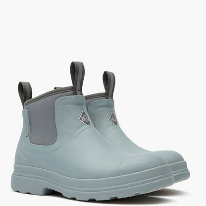 Pair of light gray rubber boots with black elastic sides on a white background