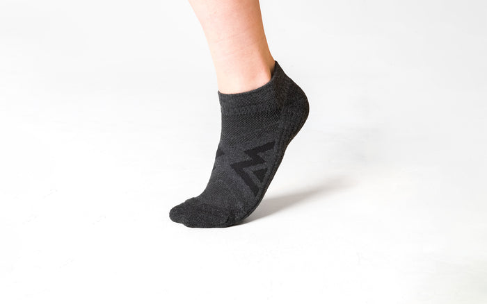 The REP Fitness REP® Midweight Low Cut Sock in Heather Cool Gray/Heather Black on body