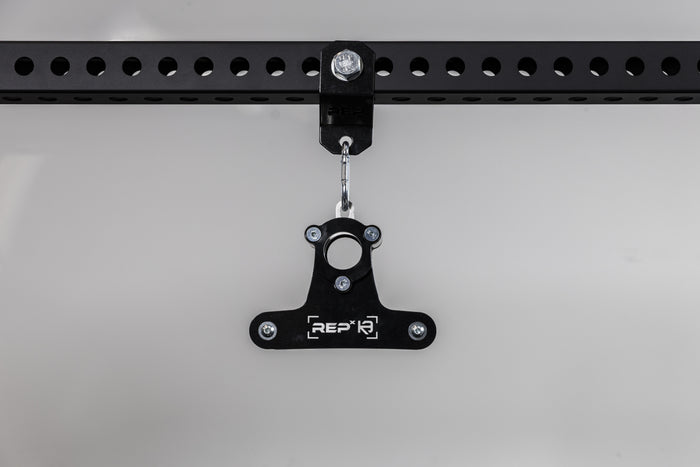 The REP Fitness Shackle attached to a PR-5000 crossmember with a REP x Kleva Built close-grip attachment