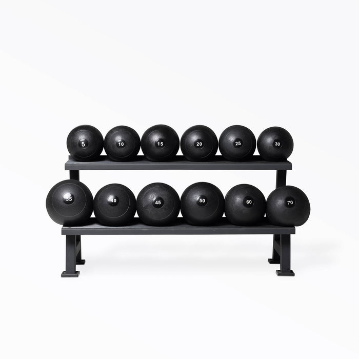 1 of each Slam Ball sizes on a rack