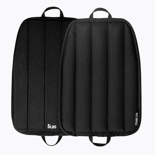 Black soft weight vest plates with '5 lbs' marking on a white background