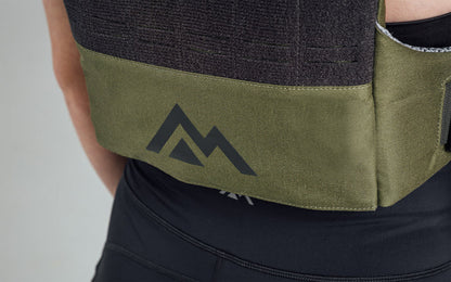 Mountain logo on the back bottom of the Strata Weight Vest